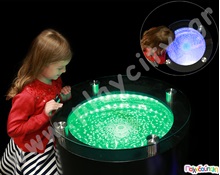 Φωτεινό κυκλικό τραπέζι με φούσκες  Ξύλινα Παιδικά Τραπεζάκια